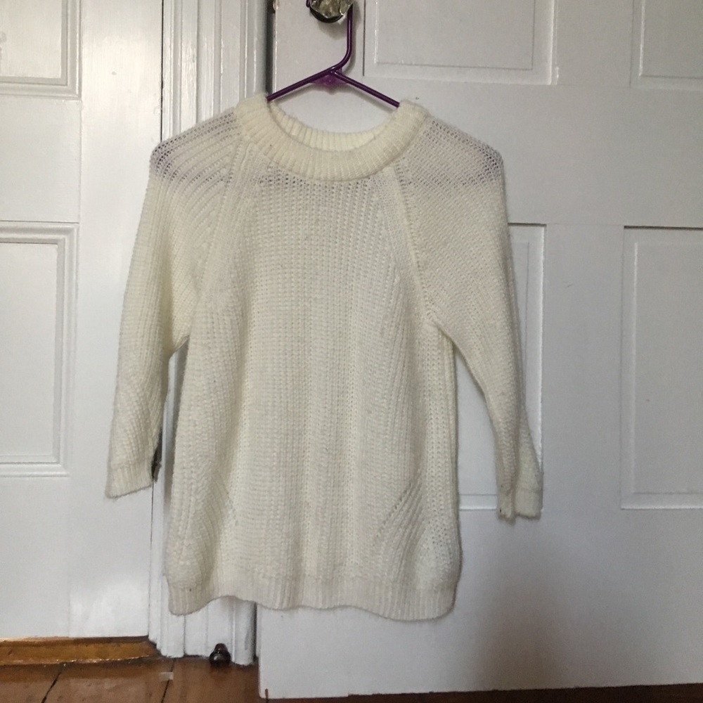cream colored sweater